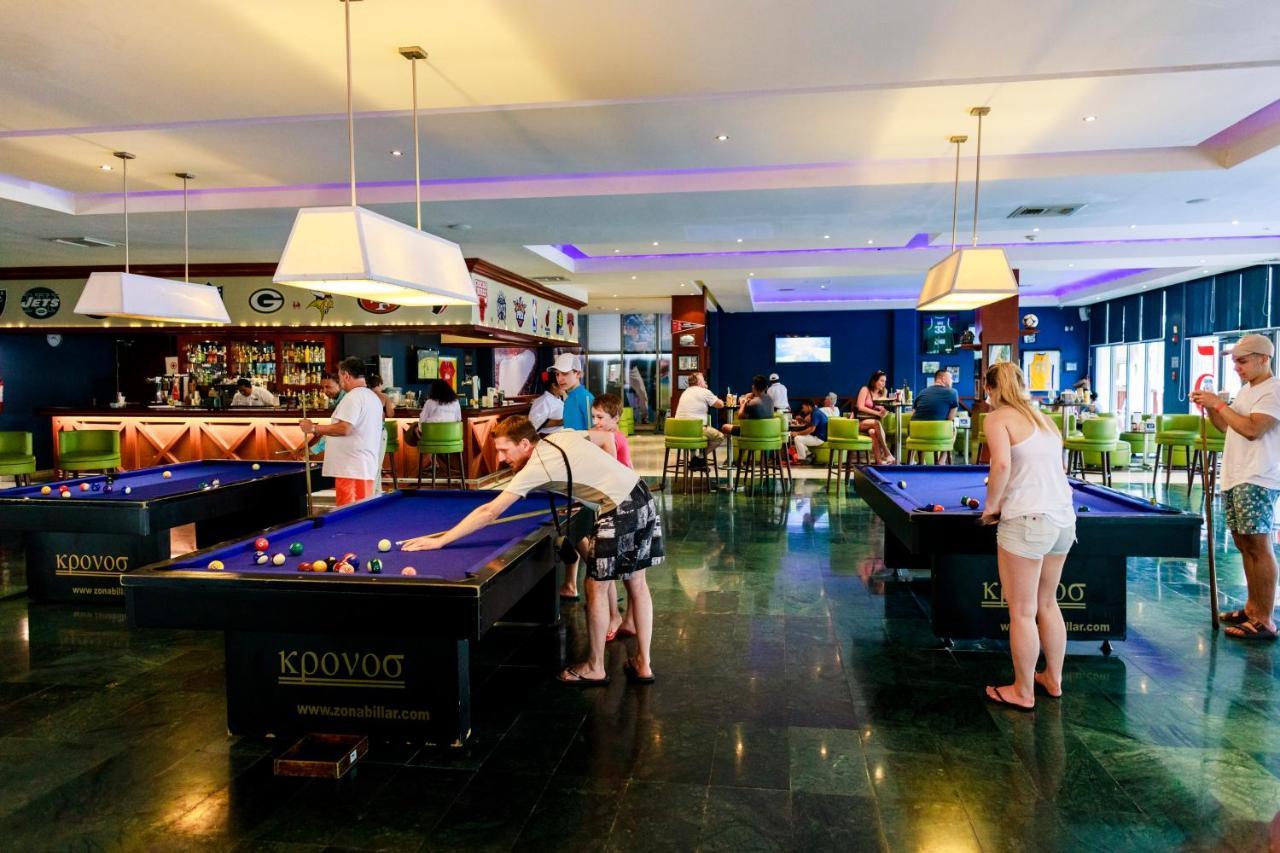 Grand Sunset Princess Playa del Carmen Exterior photo The pool table at the bar
