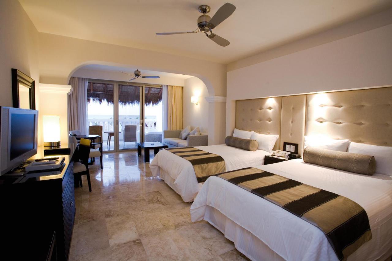 Grand Sunset Princess Playa del Carmen Exterior photo A room at the Grand at Moon Palace