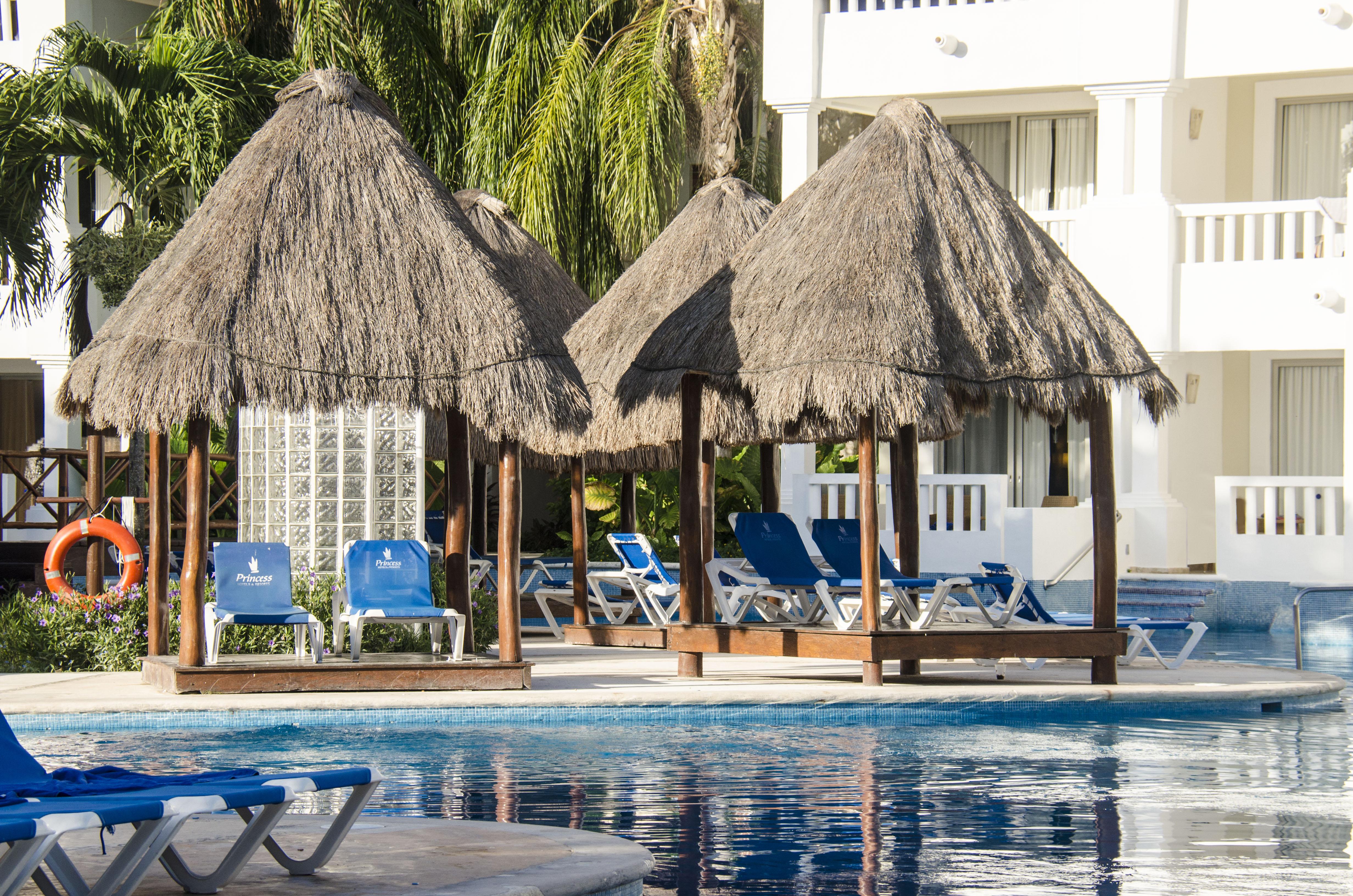 Grand Sunset Princess Playa del Carmen Exterior photo Cabanas at the pool